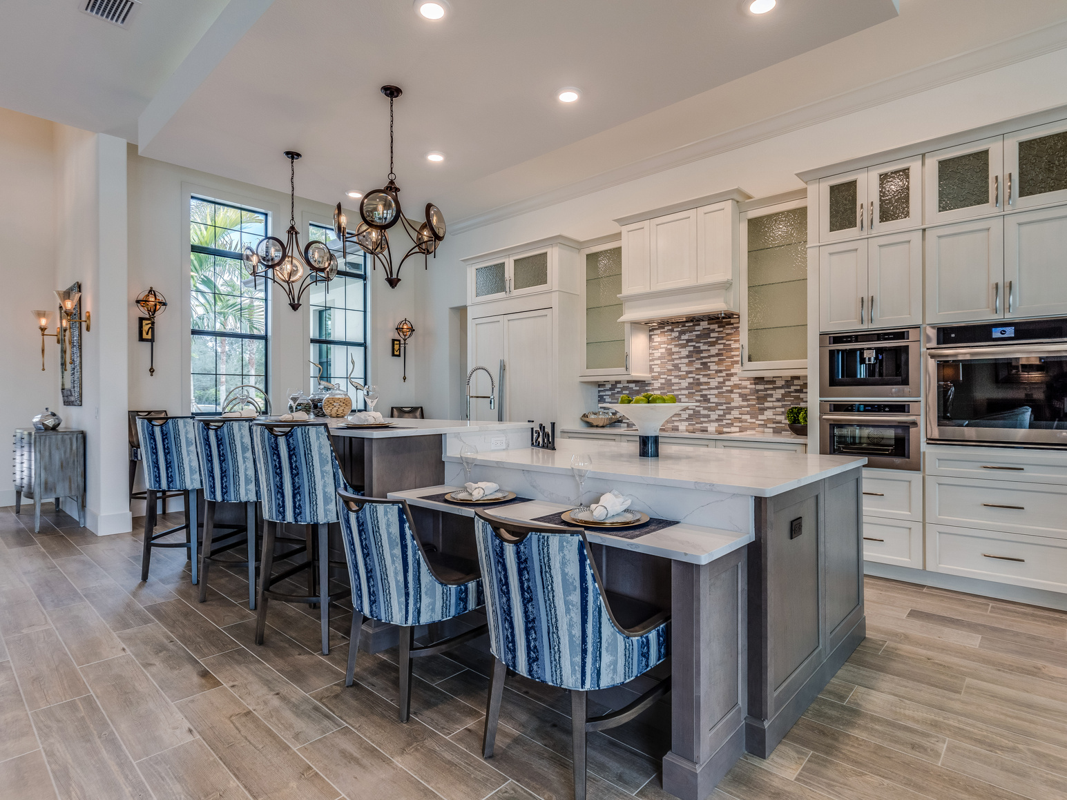 Split-level kitchen island in luxury Florida home